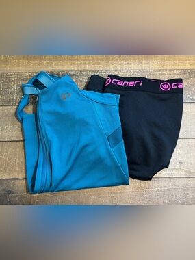 Women’s summer cycling set; Canari black bike shorts & Pearl Izumi tank, large
